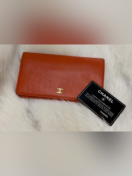 CHANEL Handbags - CHANEL Orange Calfskin Leather Bi Fold Long Slim Wallet W/ AUTHENTICITY CARD EUC